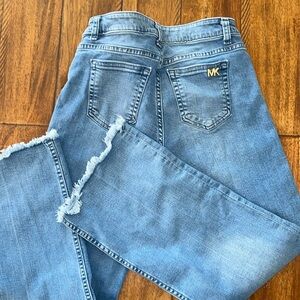 Michael Kors blue straight leg denim jeans distressed raw hems button fly size 4